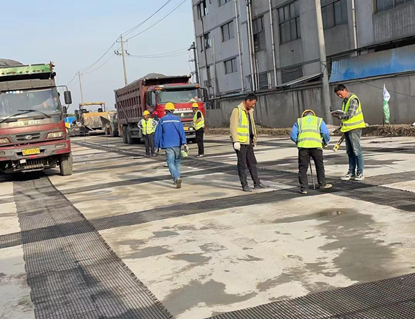 溧阳老材料的新故事:玻璃纤维土工格栅如何在‘白改黑’浪潮中重获新生?